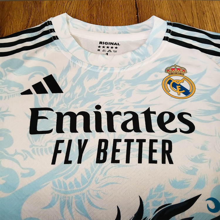 کیت فوتبالی دراگون سفید آبی رئال مادرید بدون اسم و شماره