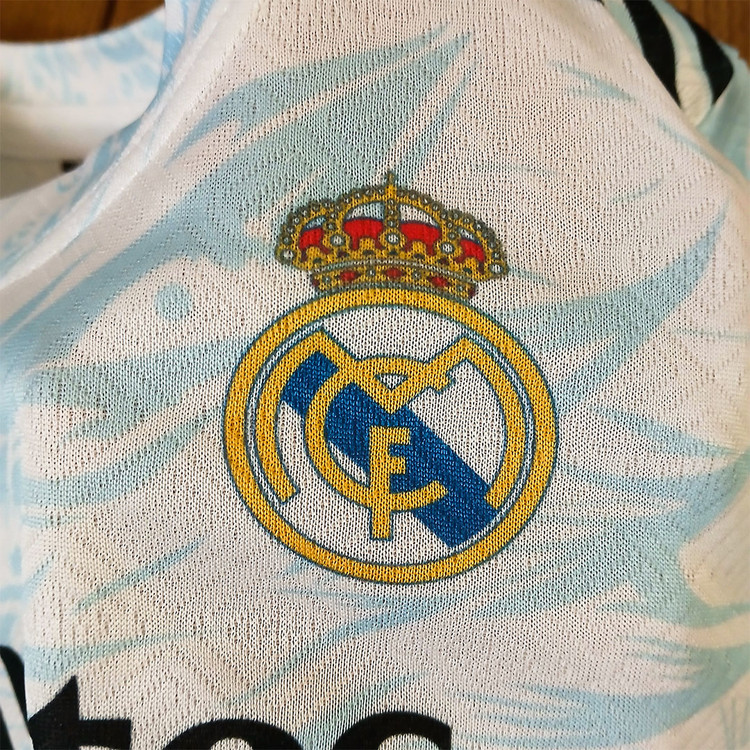 کیت فوتبالی دراگون سفید آبی رئال مادرید بدون اسم و شماره