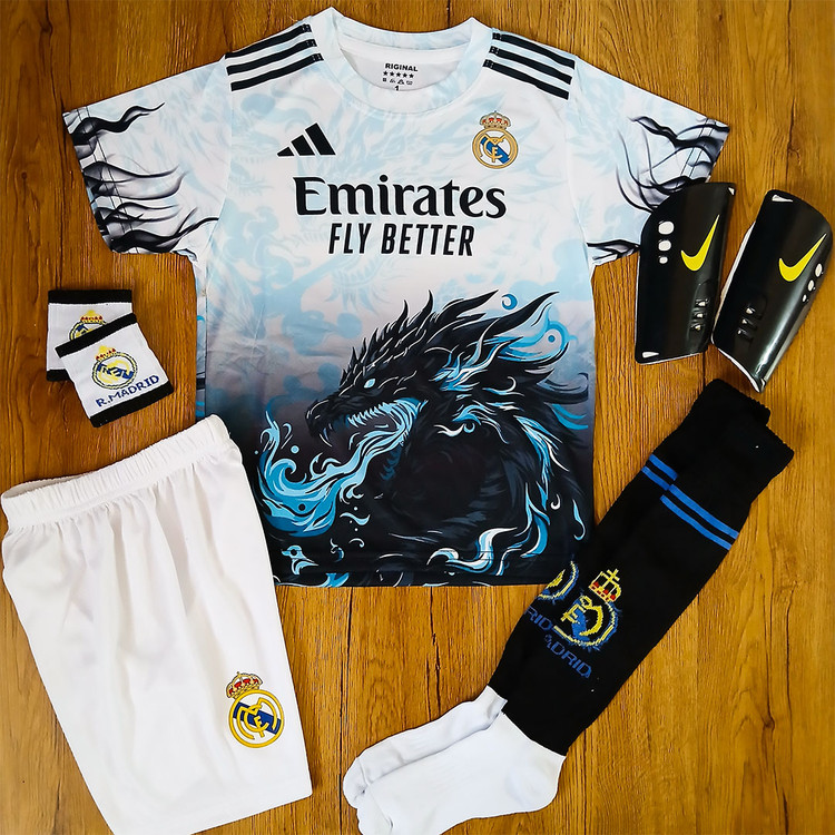 کیت 6 تیکه فوتبالی دراگون سفید آبی رئال مادرید بدون اسم و شماره طرح 2026